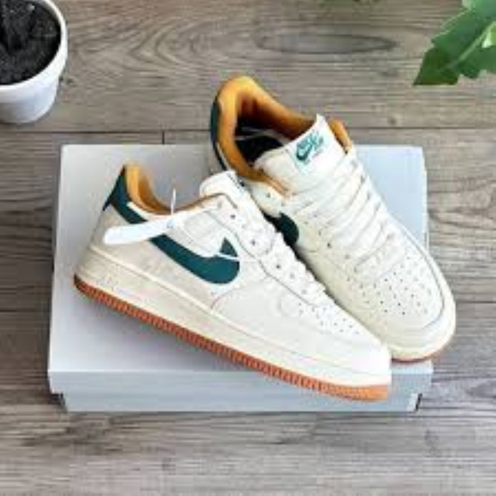 Air Force 1 Low sneakers feature a dark green swoosh